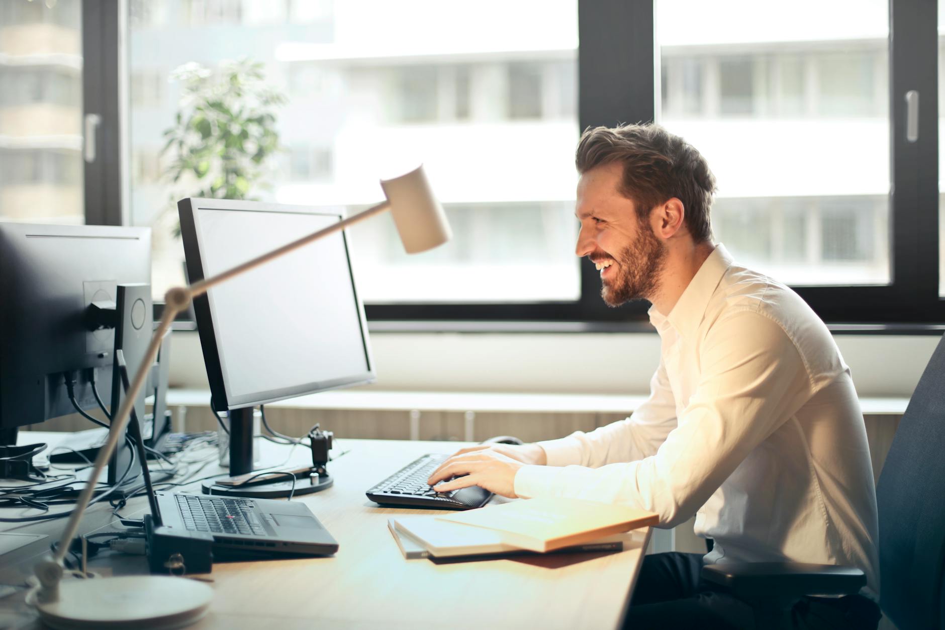 Person stretching gently in an office chair.