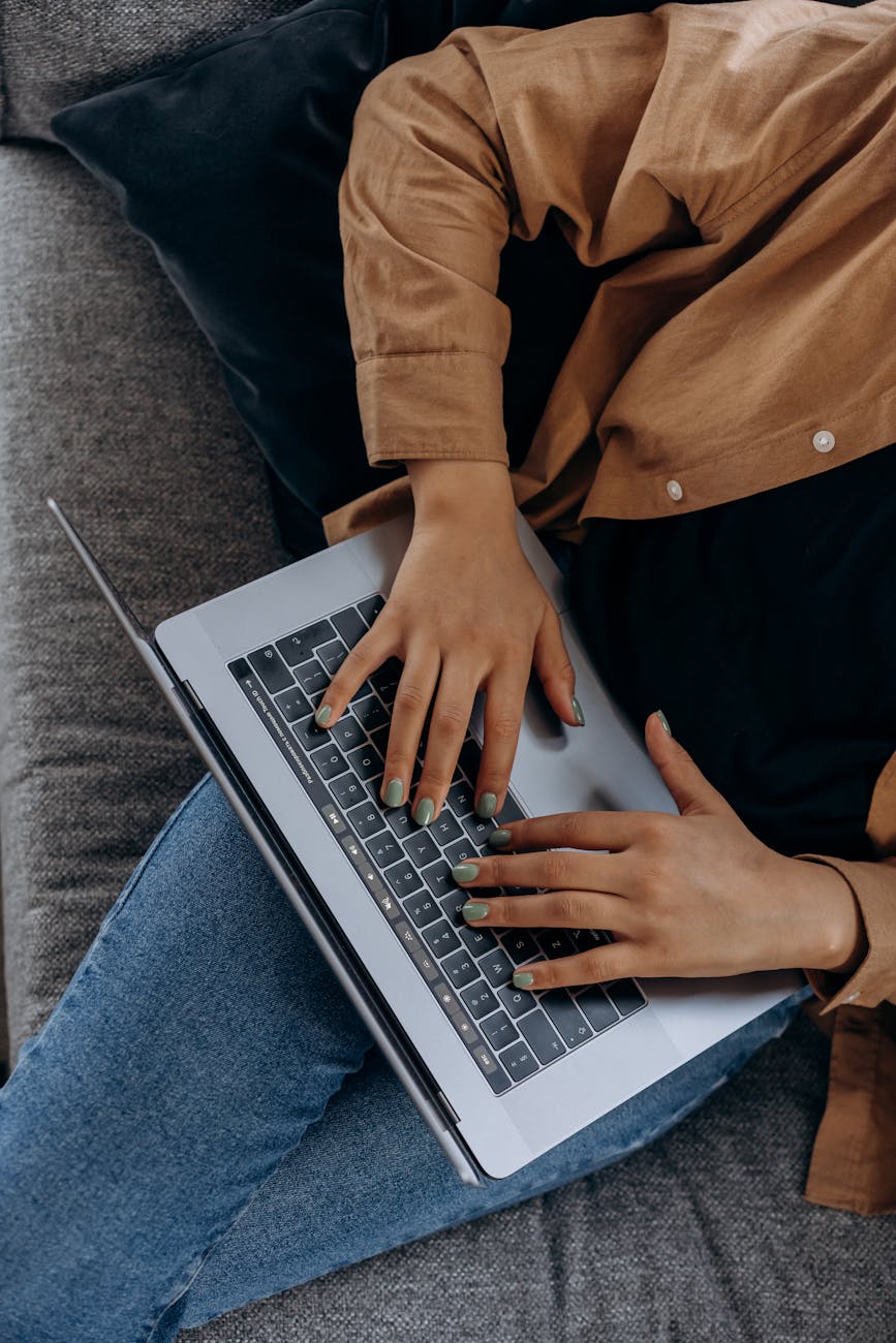 Person working at a computer with good posture.